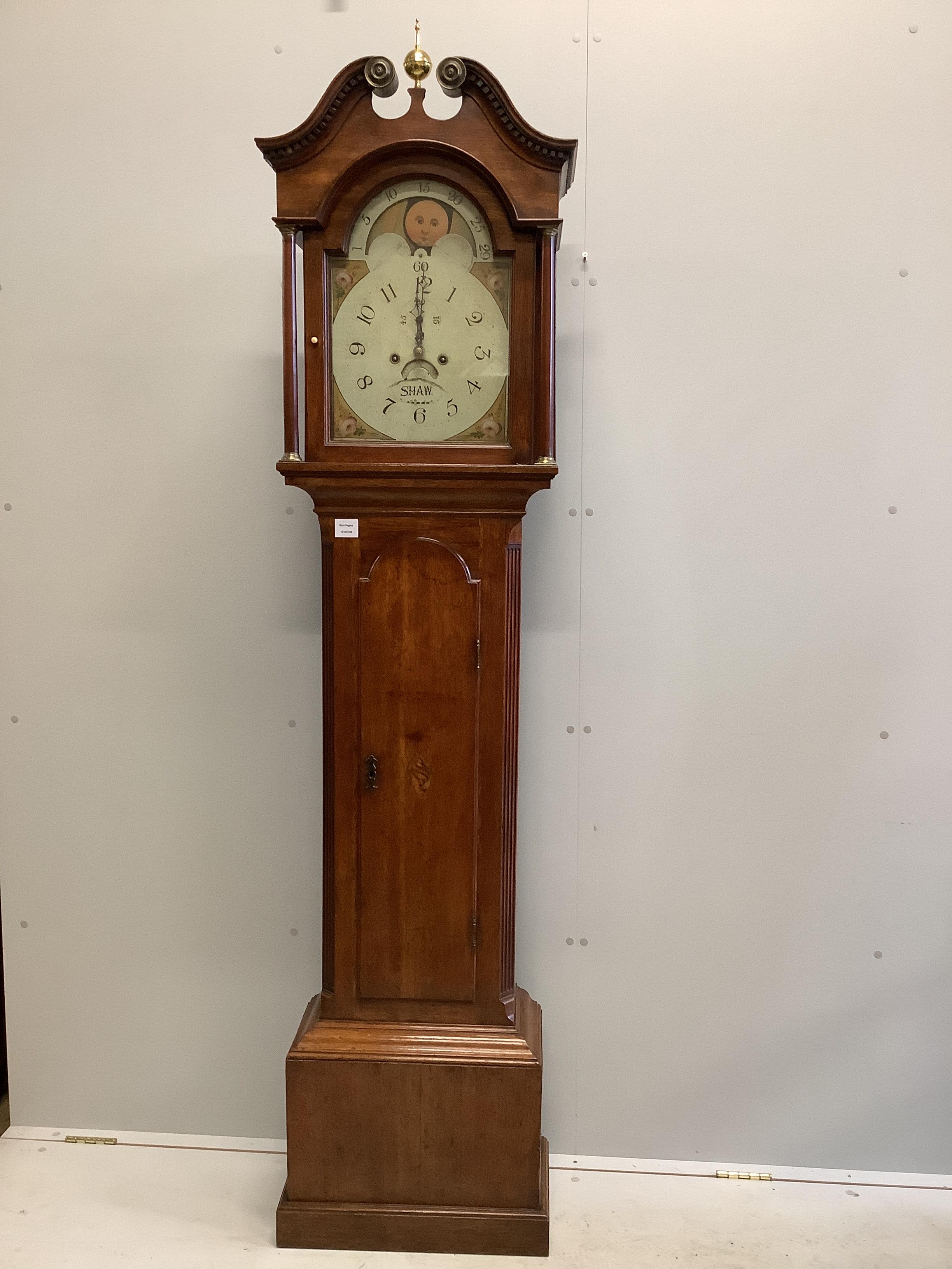An early 19th century mahogany eight day longcase clock with painted moon phase dial (no weights), height 210cm